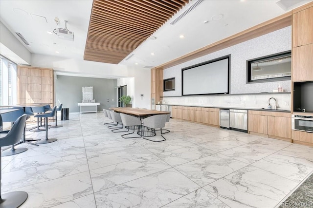 891 14th St Unit 2002, Denver, CO 80202 - interior space with light marble finish floors, a sink, and recessed lighting