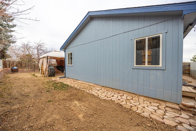 view of property exterior featuring a fenced backyard