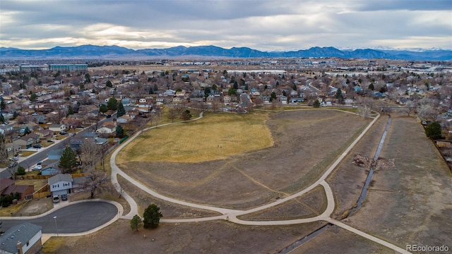 birds eye view of property featuring a mountain view and a residential view