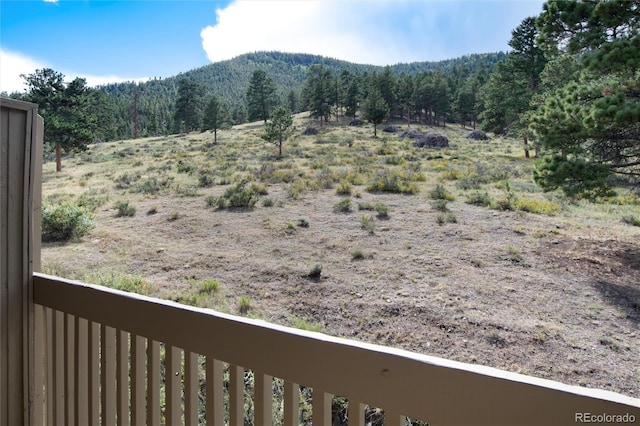 view of mountain feature featuring a view of trees