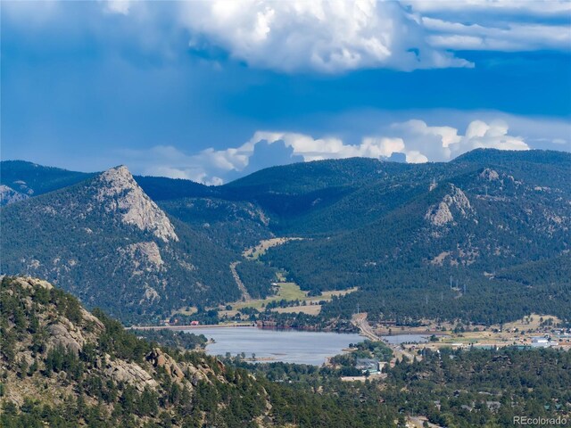 view of mountain feature featuring a water view