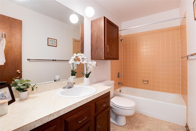 bathroom featuring bathtub / shower combination, toilet, vanity, and tile patterned flooring