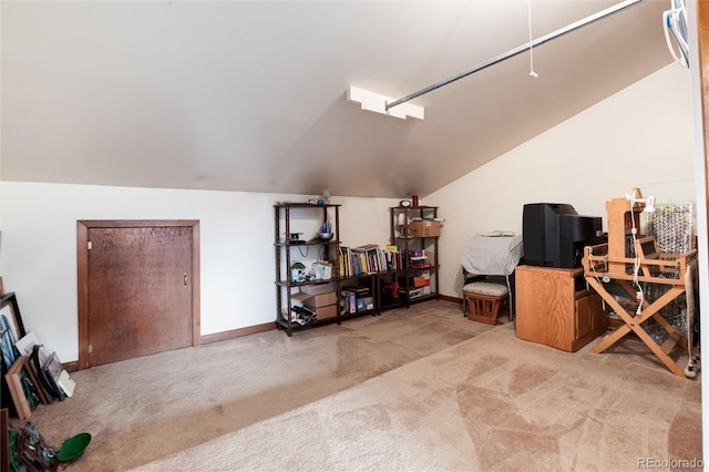 bonus room with vaulted ceiling, baseboards, and carpet floors