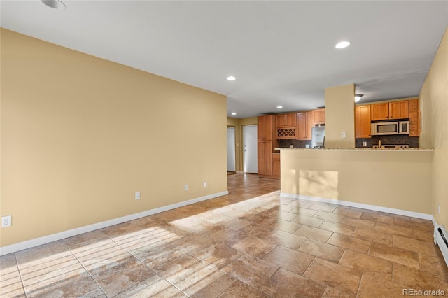 interior space featuring baseboard heating