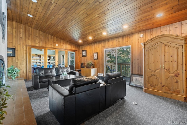 carpeted living room featuring vaulted ceiling, wooden walls, and wooden ceiling