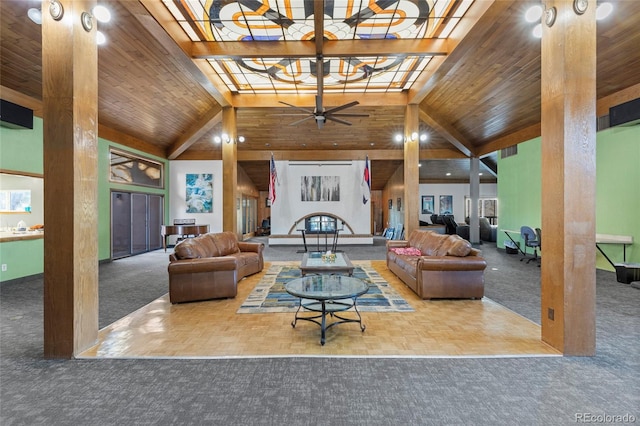 living room featuring ceiling fan, carpet floors, and high vaulted ceiling