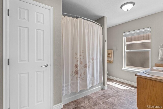 8020 Firecracker Trl, Colorado Springs, CO 80817 - full bath with vanity and baseboards