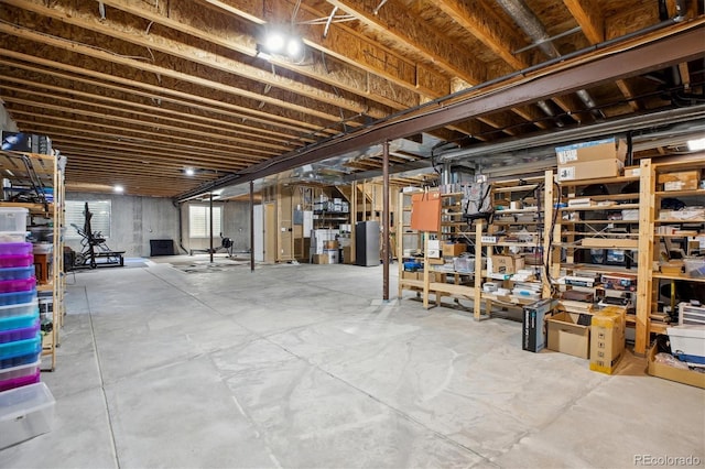 below grade area featuring water heater