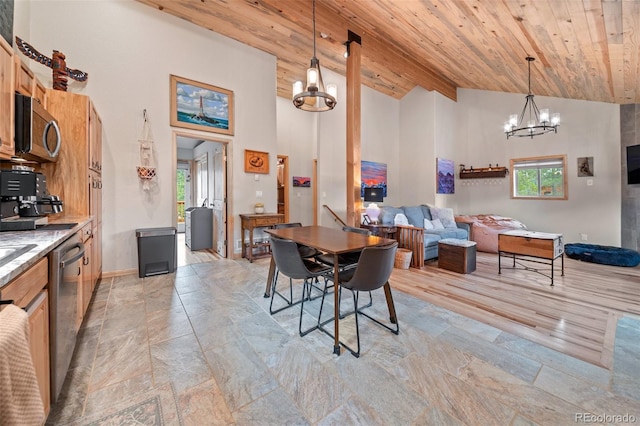 332 Harris St, Bailey, CO 80421 - dining area featuring wooden ceiling with exposed beams, a chandelier, high vaulted ceiling, and baseboards