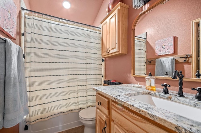 332 Harris St, Bailey, CO 80421 - bathroom with toilet, vanity, a textured wall, and shower / tub combo