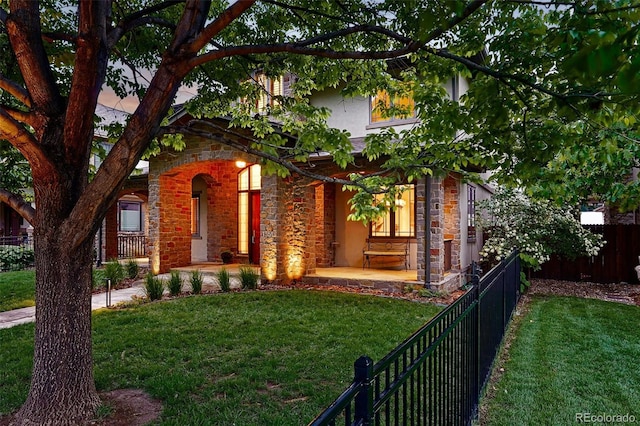 1351 S Milwaukee St, Denver, CO 80210 - view of front of home featuring stone siding and stucco siding