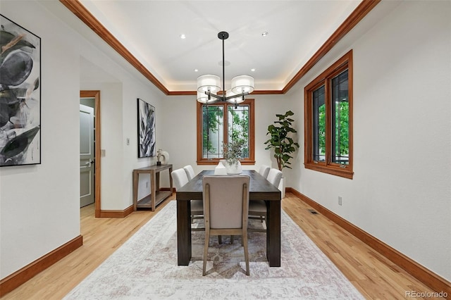 1351 S Milwaukee St, Denver, CO 80210 - dining room featuring a tray ceiling, light wood-style flooring, a chandelier, baseboards, and recessed lighting