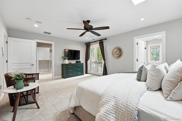 1351 S Milwaukee St, Denver, CO 80210 - bedroom featuring multiple windows, light carpet, a spacious closet, recessed lighting, and baseboards
