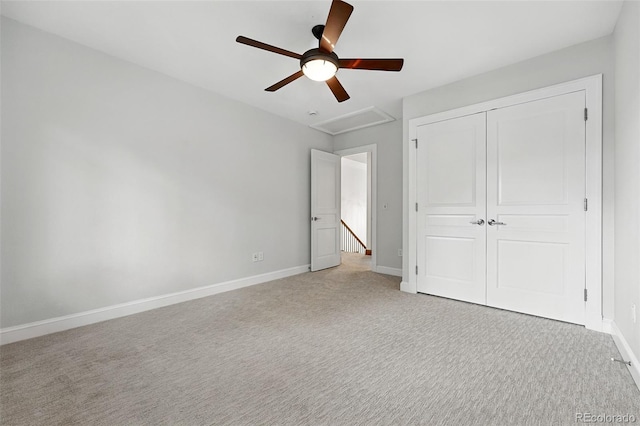 1351 S Milwaukee St, Denver, CO 80210 - unfurnished bedroom featuring light colored carpet, a closet, baseboards, and a ceiling fan