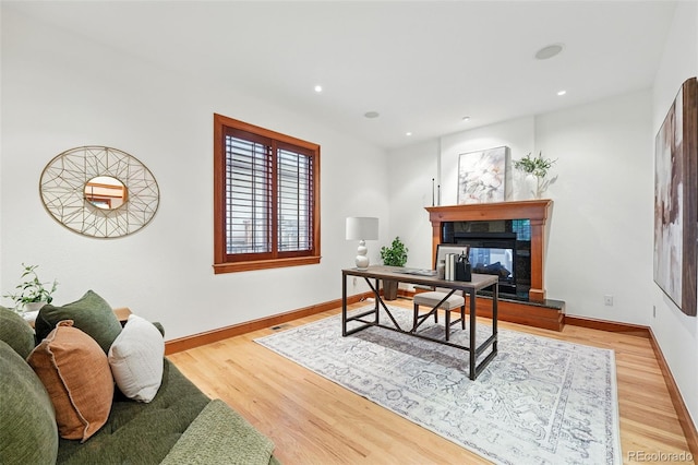 1351 S Milwaukee St, Denver, CO 80210 - office space with a multi sided fireplace, light wood-style floors, baseboards, and recessed lighting