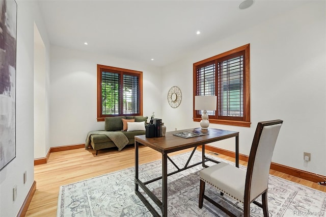1351 S Milwaukee St, Denver, CO 80210 - home office with light wood finished floors, baseboards, and recessed lighting