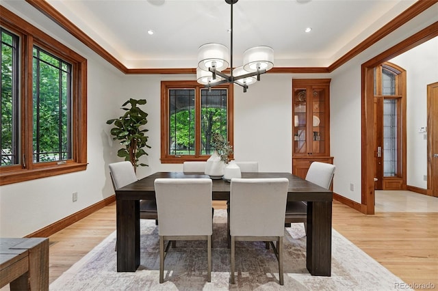 1351 S Milwaukee St, Denver, CO 80210 - dining area featuring a chandelier, light wood-style flooring, a tray ceiling, and recessed lighting