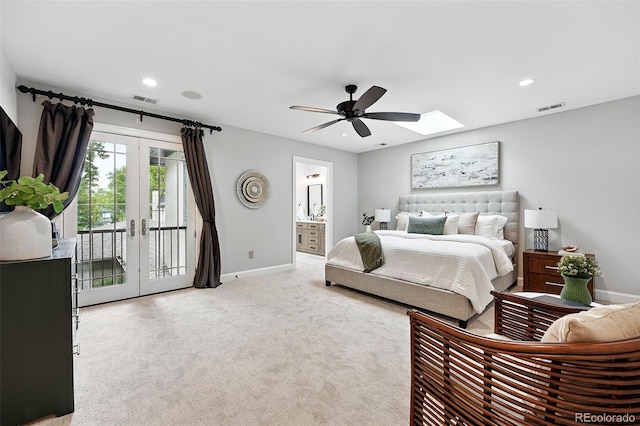 1351 S Milwaukee St, Denver, CO 80210 - bedroom featuring access to outside, baseboards, a skylight, recessed lighting, and light carpet