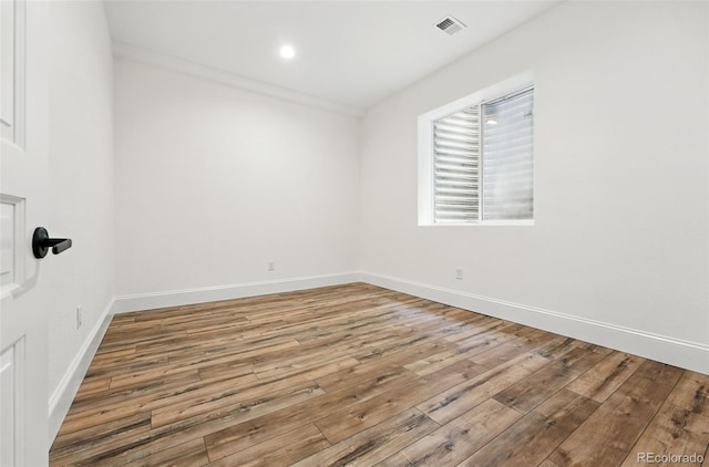 1351 S Milwaukee St, Denver, CO 80210 - spare room featuring hardwood / wood-style flooring and baseboards