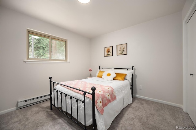 19424 Silver Ranch Rd, Conifer, CO 80433 - bedroom featuring baseboard heating, carpet flooring, and a closet