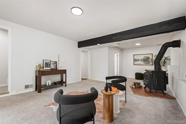 19424 Silver Ranch Rd, Conifer, CO 80433 - sitting room featuring carpet flooring and a wood stove