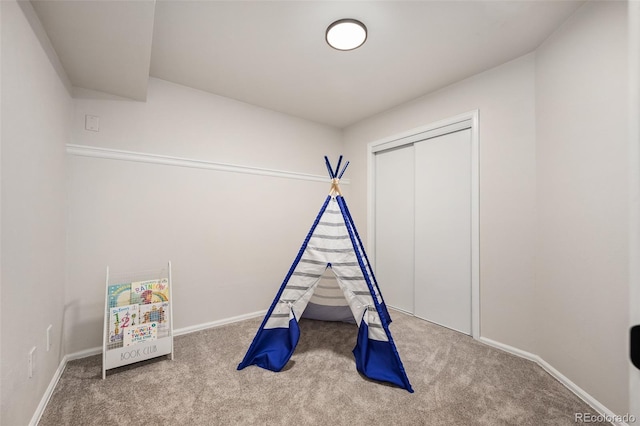 19424 Silver Ranch Rd, Conifer, CO 80433 - rec room with carpet floors and baseboards