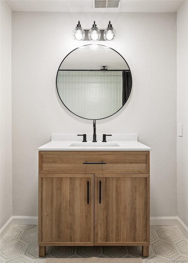 19424 Silver Ranch Rd, Conifer, CO 80433 - bathroom featuring vanity and tile patterned floors
