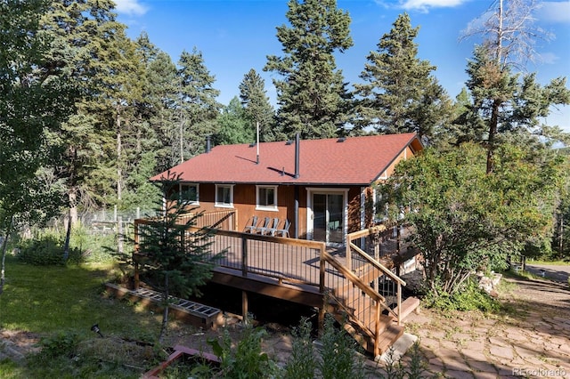 19424 Silver Ranch Rd, Conifer, CO 80433 - rear view of house with a wooden deck, a yard, and a shingled roof