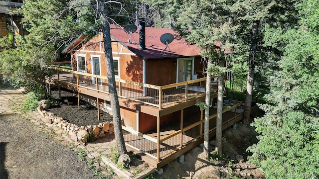 19424 Silver Ranch Rd, Conifer, CO 80433 - back of house featuring a wooden deck and a shingled roof