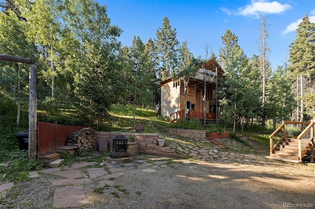 19424 Silver Ranch Rd, Conifer, CO 80433 - view of yard with stairway and a patio area