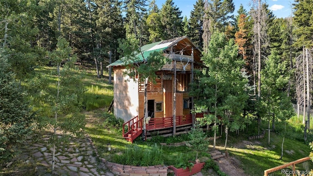 19424 Silver Ranch Rd, Conifer, CO 80433 - view of outbuilding with a view of trees