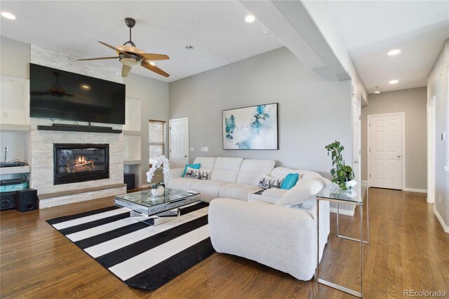 1550 Ajax St, Strasburg, CO 80136 - living area featuring a ceiling fan, recessed lighting, wood finished floors, and a large fireplace
