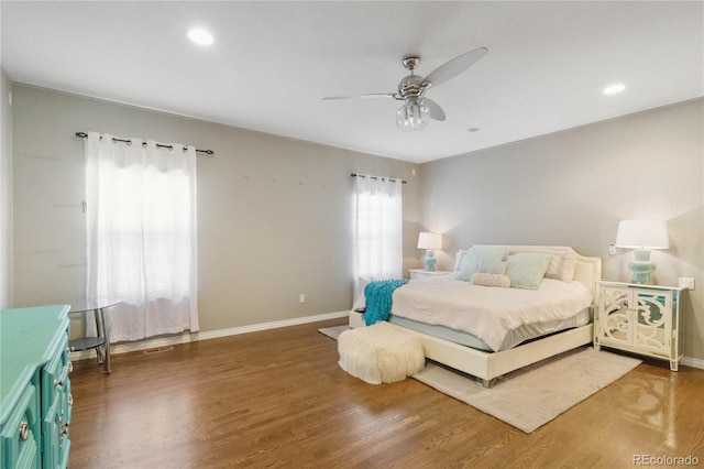 1550 Ajax St, Strasburg, CO 80136 - bedroom with wood finished floors, recessed lighting, and a ceiling fan