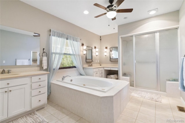 1550 Ajax St, Strasburg, CO 80136 - bathroom with tile patterned flooring, a ceiling fan, a shower stall, and recessed lighting