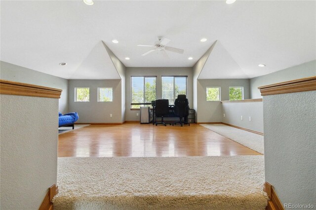 1550 Ajax St, Strasburg, CO 80136 - living room with healthy amount of natural light, a ceiling fan, wood finished floors, a desk, and recessed lighting