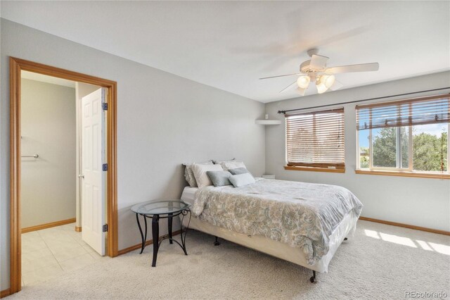 1550 Ajax St, Strasburg, CO 80136 - carpeted bedroom featuring baseboards and ceiling fan