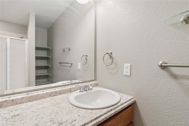 1550 Ajax St, Strasburg, CO 80136 - full bath featuring a stall shower and vanity
