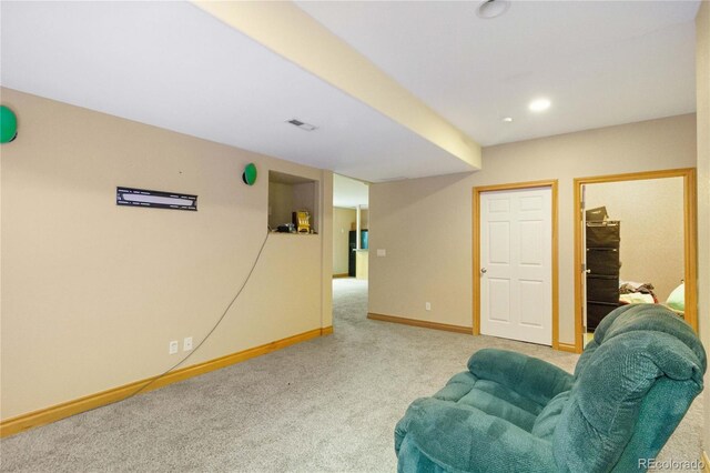1550 Ajax St, Strasburg, CO 80136 - sitting room featuring baseboards and carpet