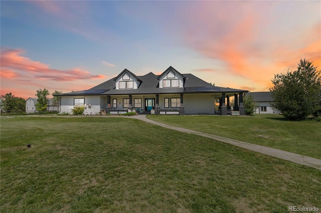 1550 Ajax St, Strasburg, CO 80136 - modern inspired farmhouse with a porch and a front lawn