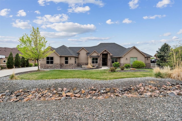 12939 Wabash Ct, Thornton, CO 80602 - ranch-style house featuring stone siding, stucco siding, and a front lawn