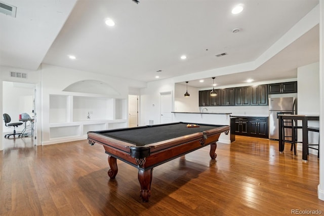 12939 Wabash Ct, Thornton, CO 80602 - recreation room with wood finished floors, built in features, billiards, and recessed lighting