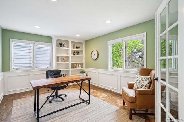 5320 S Geneva St, Englewood, CO 80111 - office space with wood finished floors, a decorative wall, a wainscoted wall, and recessed lighting