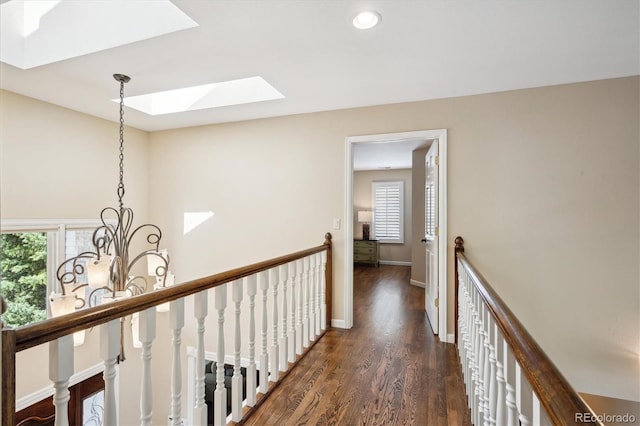 5320 S Geneva St, Englewood, CO 80111 - hall with a skylight, an upstairs landing, dark wood-style floors, healthy amount of natural light, and recessed lighting