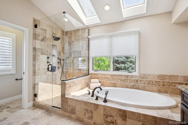 5320 S Geneva St, Englewood, CO 80111 - bathroom with a stall shower, a bath, and a skylight