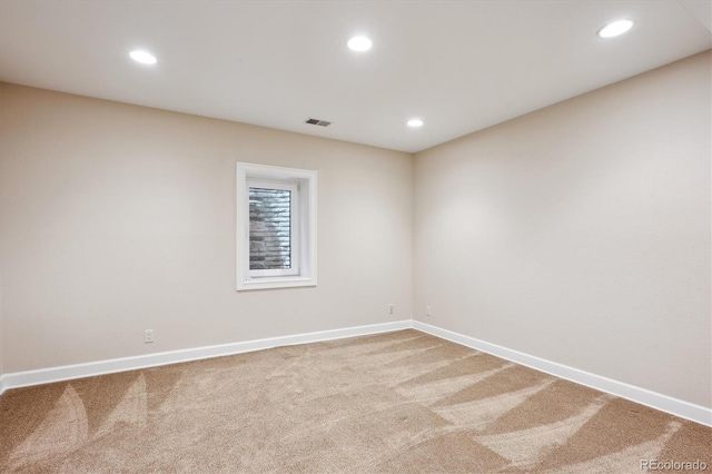 5320 S Geneva St, Englewood, CO 80111 - carpeted spare room featuring baseboards and recessed lighting