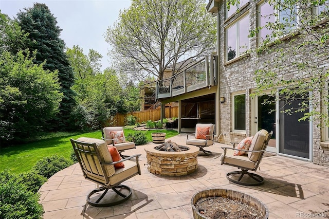 5320 S Geneva St, Englewood, CO 80111 - view of patio / terrace with a fire pit and a balcony