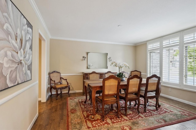 5320 S Geneva St, Englewood, CO 80111 - dining area featuring crown molding, wood finished floors, and baseboards