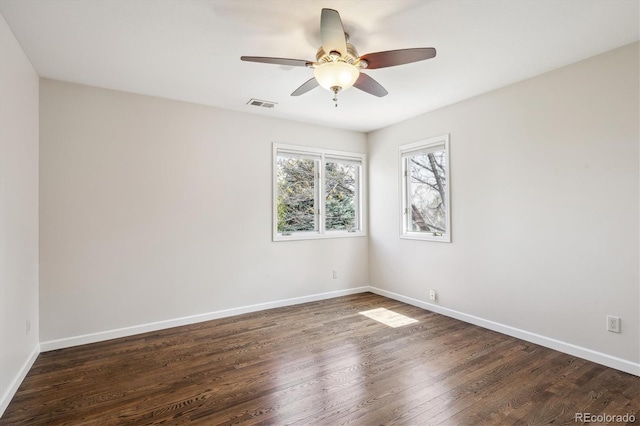 5320 S Geneva St, Englewood, CO 80111 - spare room featuring dark wood-type flooring, baseboards, and ceiling fan