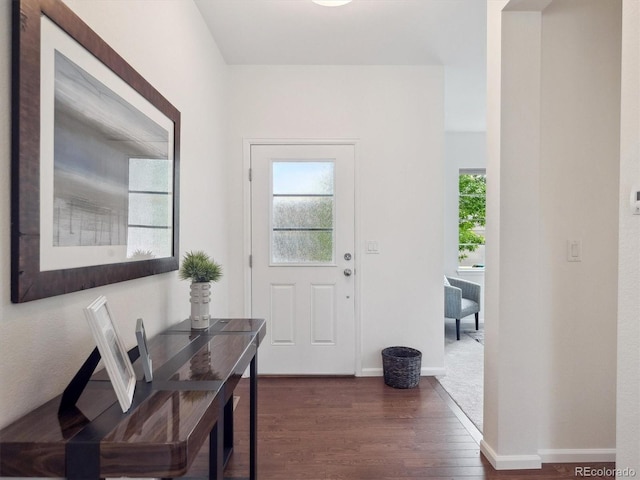 15350 W 50th Dr, Golden, CO 80403 - entryway featuring dark wood finished floors and baseboards