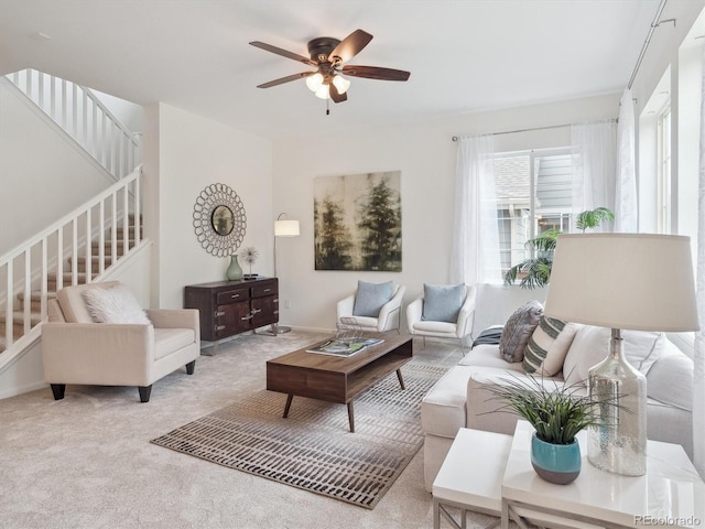 15350 W 50th Dr, Golden, CO 80403 - carpeted living room with stairway and ceiling fan